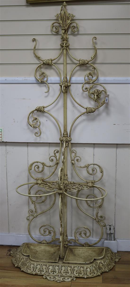 A Victorian style wrought iron hall stand W.85cm